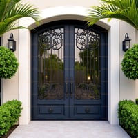 Arched Double Doors With Ornate Metalwork and Symmetrical Landscaping
