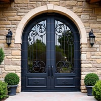 Arched Double Front Door With Wrought Iron and Floral Accents