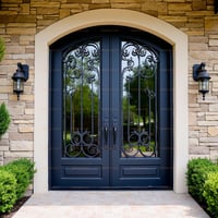 Arched Double Doors With Wrought Iron, Set in Stone Facade