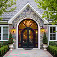 Arched Black Metal and Glass Double Door With Stone Archway Entrance