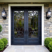 Dark Blue Gray Metal Double Doors With Wrought Iron and Stone Wall