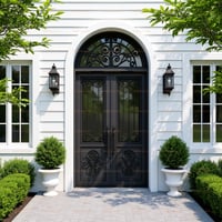 Elegant Dark Gray Metal Double Doors With Ornate Transom Window
