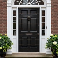 Black Six-panel Entry Door With Sidelights, Fanlight, and Lion Knocker