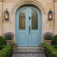 Arched Double Doors With Leaded Glass, Stone Frame, and Floral Carvings