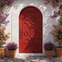 Arched Red Wood Door With Intricate Interwoven Design and Stone Paving