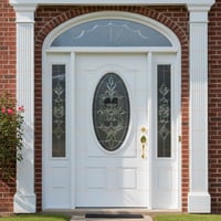 White Front Door With Oval Glass, Floral Accents, and Fluted Columns