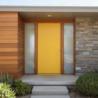 Bright Yellow Flat-panel Door With Frosted Sidelights and Wood Trim