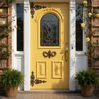 Yellow Arched Door With Ornate Glass, Sidelights, and Climbing Roses