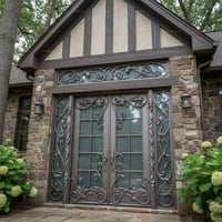 Ornate Wrought Iron Double Door With Glass Panes and Stone Facade