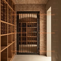 Arched Double Doors With Ornate Iron Scrollwork and Dark Blue Metal Finish