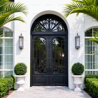 Wrought Iron Double Door With Arched Windows and Decorative Scrollwork
