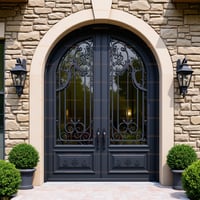 Arched Double Doors: Dark Gray Metal With Ornate Wrought Iron Grillwork