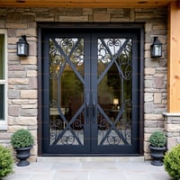 Black Metal Frame Double Doors With Decorative Wrought Iron and Stone Wall